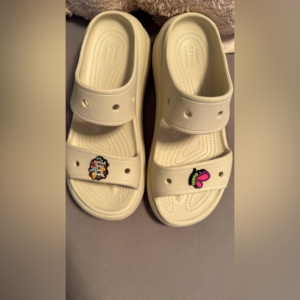 New bone colored crocs with thick sole for easier walking in comfort.